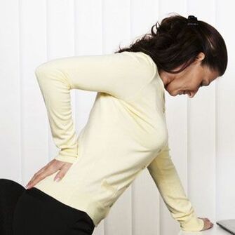 Dolor lumbar en una mujer.